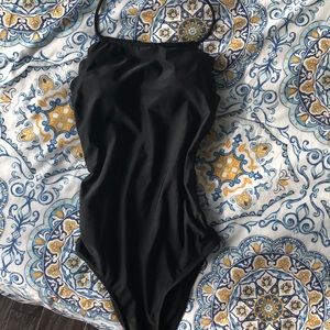 Scallop halter top black swimsuit.